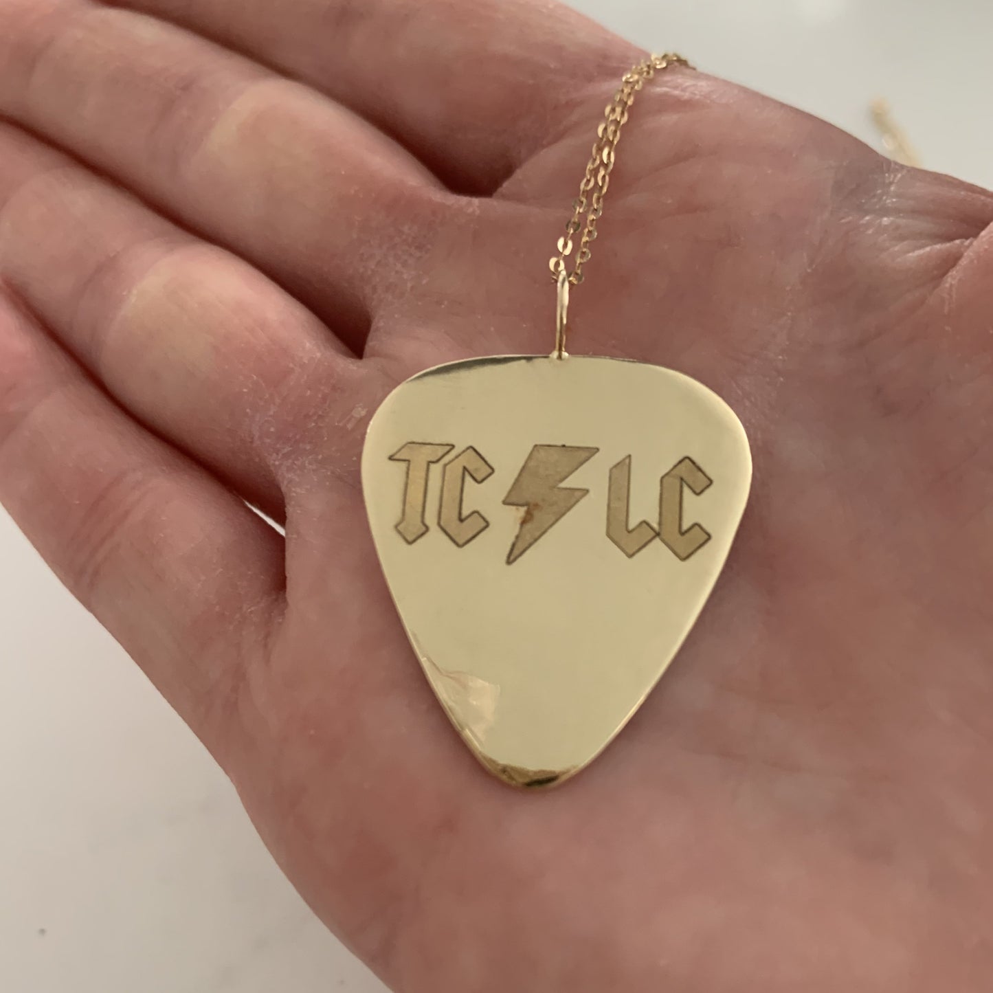 The Rocker Guitar Pick Necklace